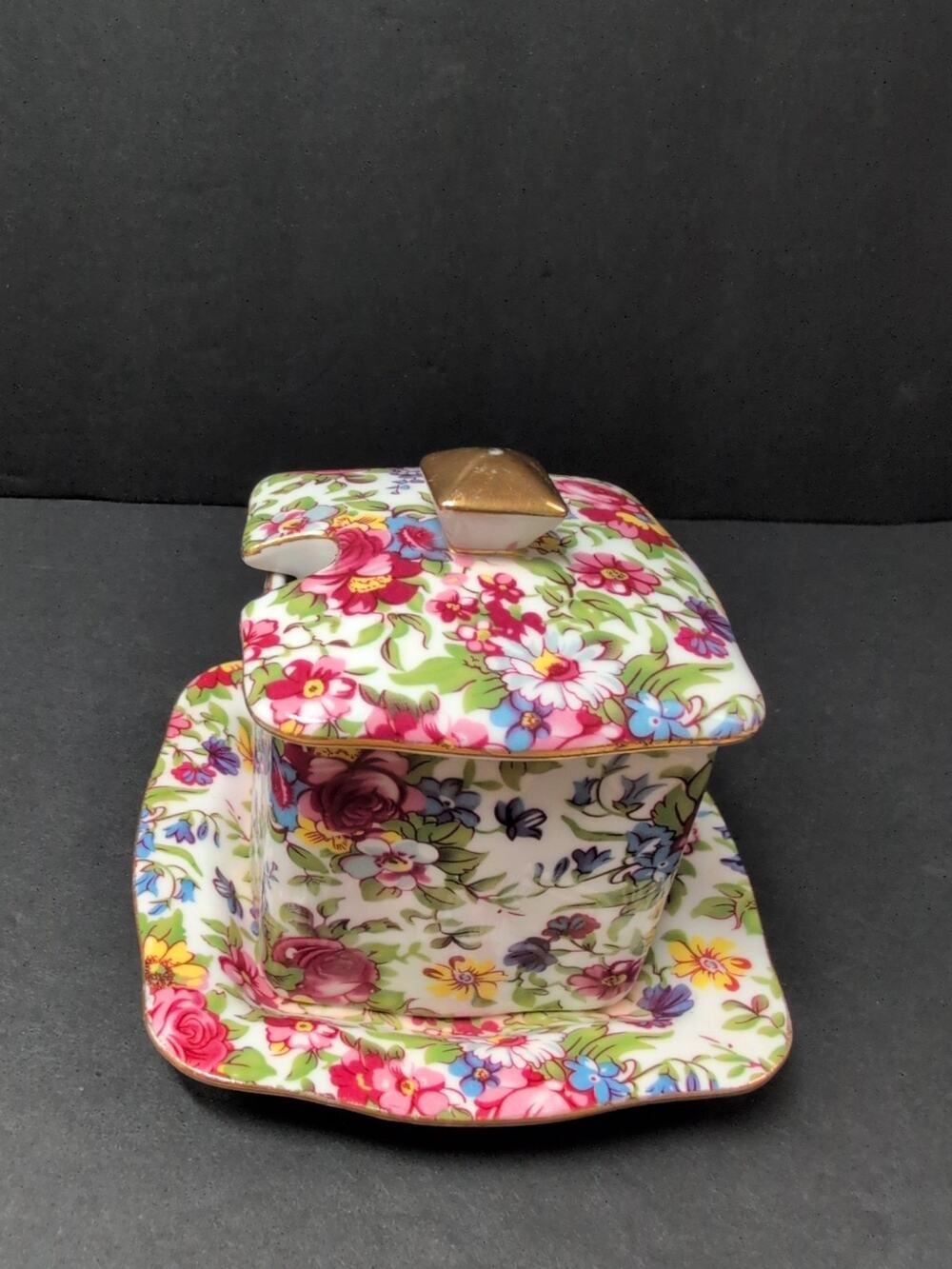 Royal Cotswolds Summertime chintz jam/jelly pot and lid with an underplate.
